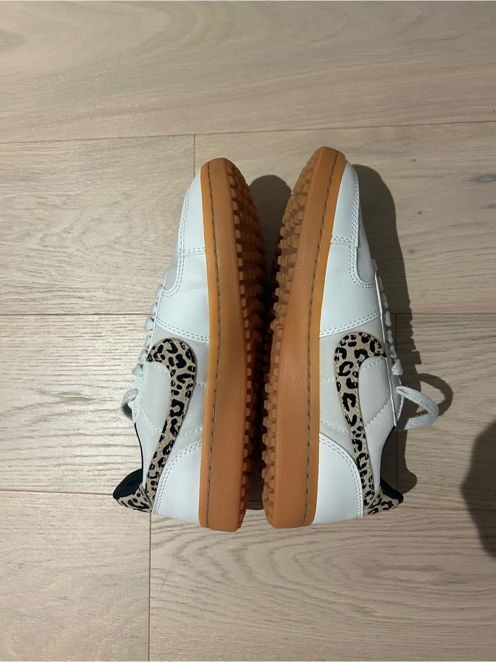 Nike White Sneakers with Leopard Swoosh and Gum Sole